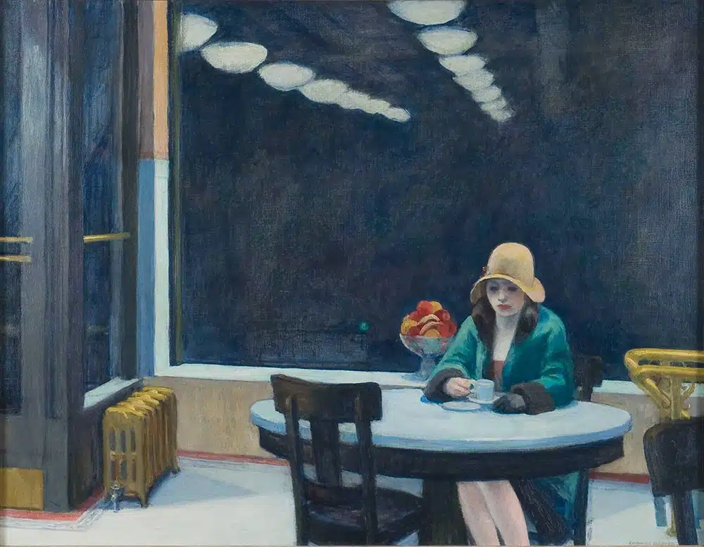 automat Donna solitaria in un caffè hopper